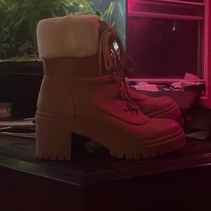 brand new light brown heeled boots.